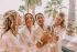 Préparatifs de mariage : la mariée partage un toast au champagne avec ses témoins
